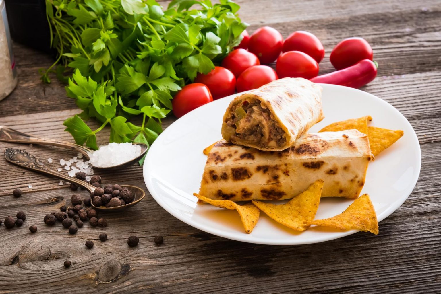 burrito with chips and vegetables Viva Mexico